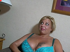 Salacious BBW with tattooed big tits showcases her exemplary oral skills in a close up shoot