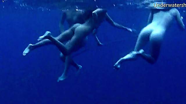 Two foxy slim stunners enjoy revealing their bodies in the ocean