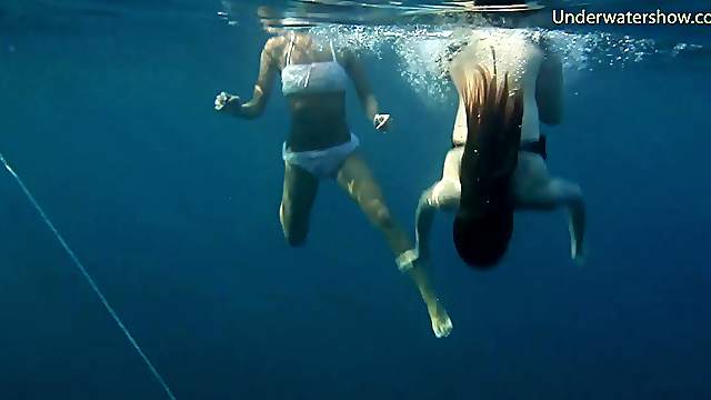 Lustful babes enjoy showing off their bodies underwater