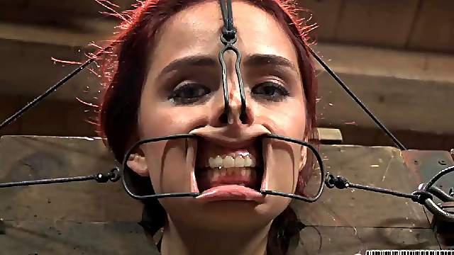 Randy slave with red hair gets tortured by a kinky guy