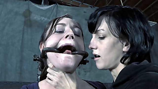 Hot babe's pussy gets wet while she enjoys a BDSM session