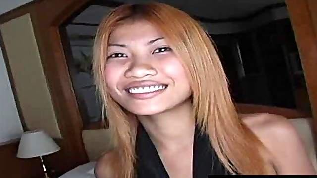 Petite redhead babe from Asia decides to take it from the behind