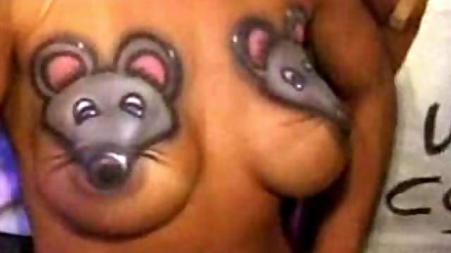 Model showcasing her natural tits in public party