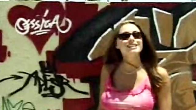 Brunette natural tits caressed in public porn scene
