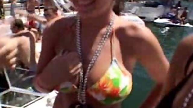 Hot babes enjoy teasing men with their bodies during a beach party
