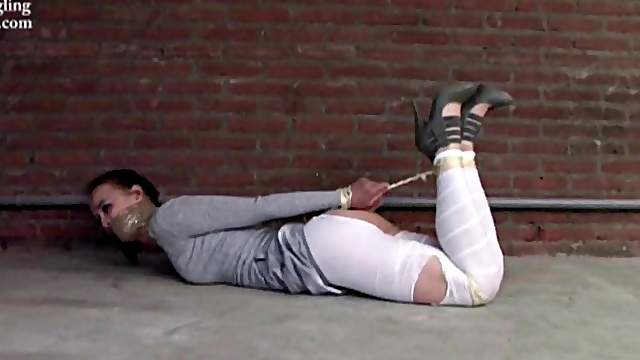 Seeing Emma hogtied with her ass revealed will make you hard