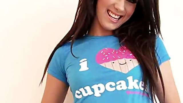 Brunette in colourful socks masturbates with a small toy
