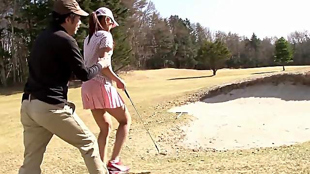 Japanese cutie in pink polo shirt and matching hat gets her pussy pleasured by vibrators
