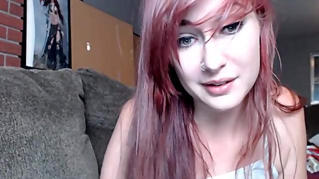 A Attractive Redhead Teen Is Having Fun By Herself