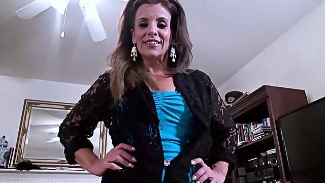 Sexy mature stripping down seductively and playing with adult toys