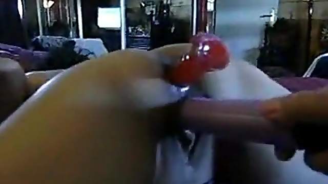 MILF takes toys in her brown fuck holes