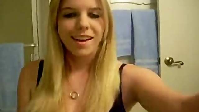 Blonde removing her black lingerie