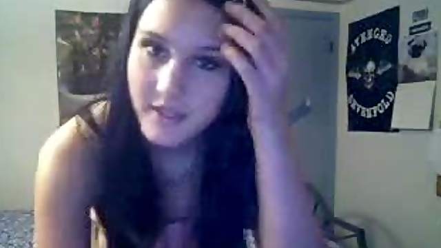 Lovely brunette girl getting totally naked