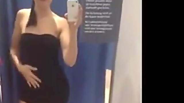 Sexy brunette girl rubs her pussy in front of the mirror