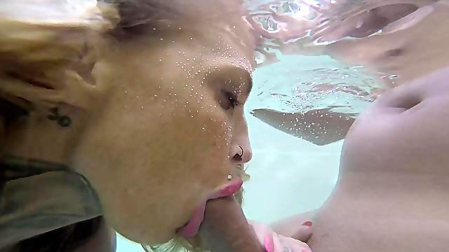 Busty Calisi Ink enjoys slurping on a big delicious shaft