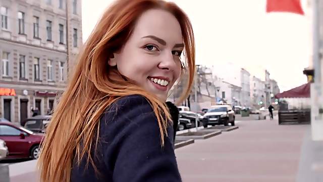 Young redheaded vixen Candy Red is passionately fucked with a huge cock