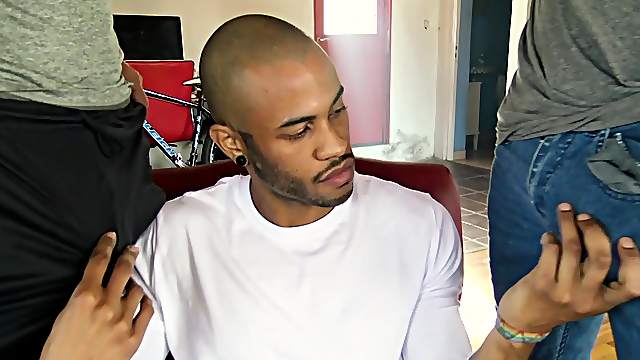 Latino stud crams two cocks in his mouth