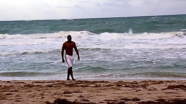 Black sporty gay dude masturbates and cums on himself solo