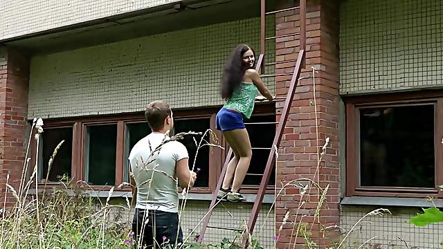 Teen brunette Angel Dickens climbs on the roof to fuck with her man