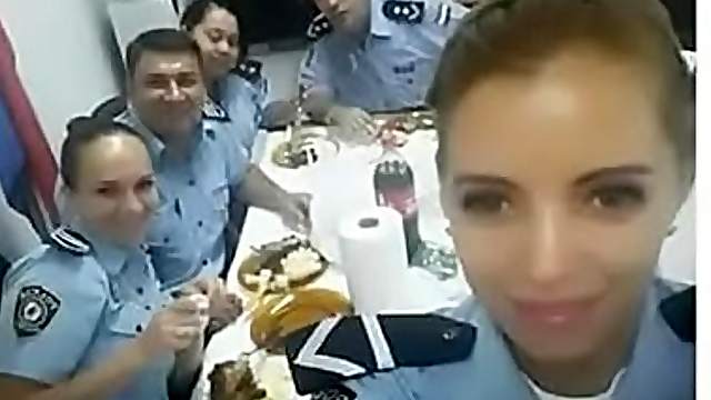 Blue eyed beauty sucks a hard cock close up in an office