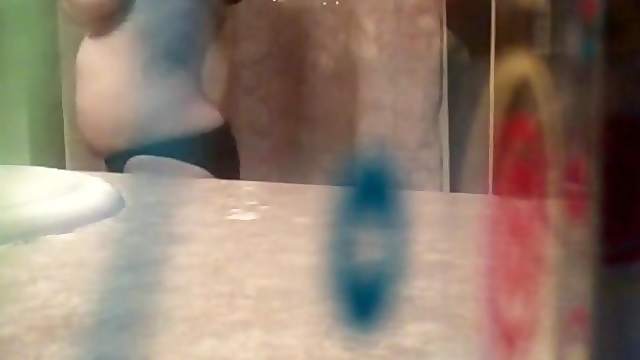 My wife takes a shower while she is totally unaware of the hidden camera