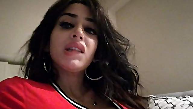 attractive black hair bomb likes to show her body and face to the camera