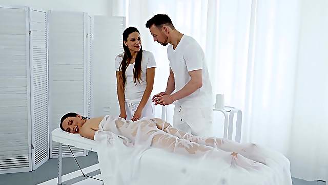 During the massage Izzy Lush gets her pussy pleased by her masseur