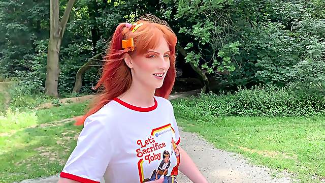 Redhead teen Alex Harper with pigtails does a photoshoot in the woods
