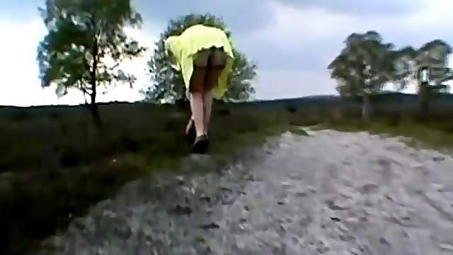 Walking in nature without panties and stockings