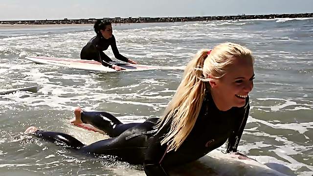 Lovely Lesbian babes going wild at the beach and eating each other out
