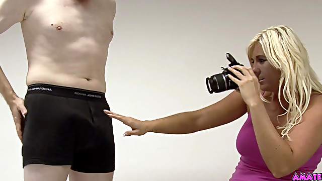 Blonde photographer enjoys stoking dick of her client - Donna Mills