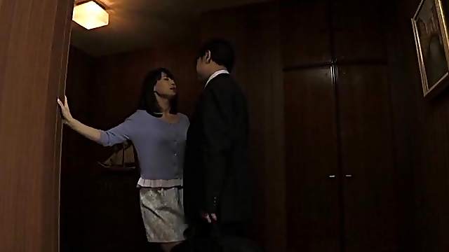 Horny Japanese wife drops on her knees to suck his hard dick