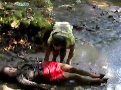 Lustful lesbian duo gets wet clothed in the river