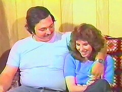 Retro porn video of a brunette wife being fucked on the bed