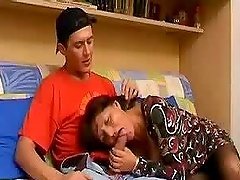 Mature brunette gives a handjob before getting amazingly fucked