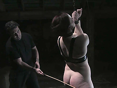 Kinky redhead chick gets hog tied and toyed deep in both holes