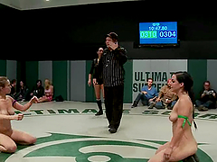 Three nasty sluts wrestle in a ring and lick pussies