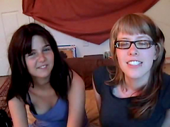 Nerdy girls in glasses lick and then toy their pussies