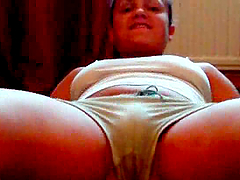 Lewd chick shows her cameltoe and fingers her snatch