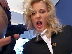 A hot cougar in a uniform gives a guy an amazing handjob