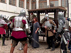 Two knights fuck a peasant woman in a wooden house