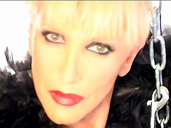 Short-haired blondie Mistress Alexandra loves to dominate men