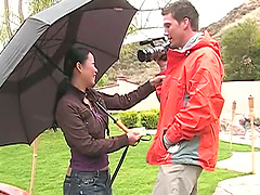 He takes the camera from the Asian girl and convinces her to suck dick