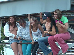 Randy teens on water ride enjoys stripping and displays ass and tits