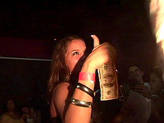 Sexy amateur brown-haired chick strips in a club for money