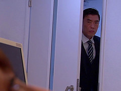 Attractive Japanese dame giving superb blowjob in the office in close up shoot