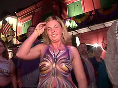 Party girls flashing their tits on the street for beads