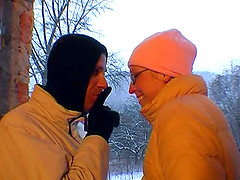 Girlfriend with glasses gives outdoor blowjob on a snowy day