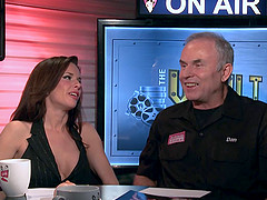 Sizzling porn star with great juggs laughing and chatting backstage