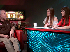 Pornstars host a talk show with a producer on as their guest